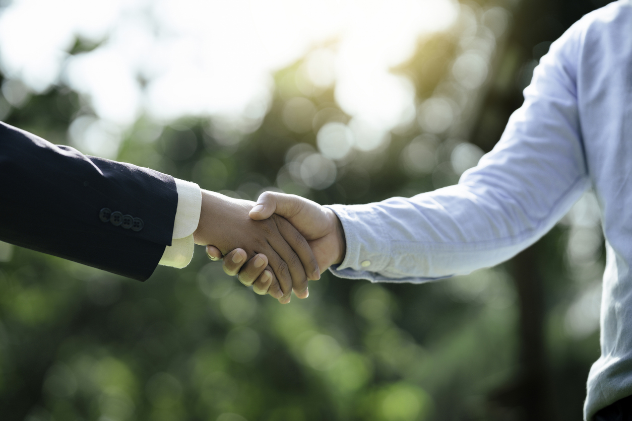 Businessman Hands Placing Together For Sustainable Development Goals. Company Or Businesses And Corporations That Care About The Environment