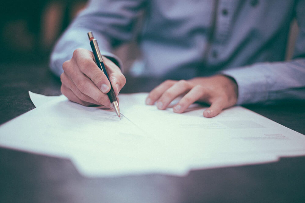 Businessman writing