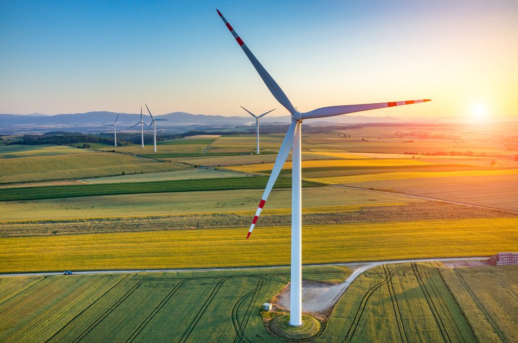 Beautiful,sunset,above,the,windmills,on,the,field
