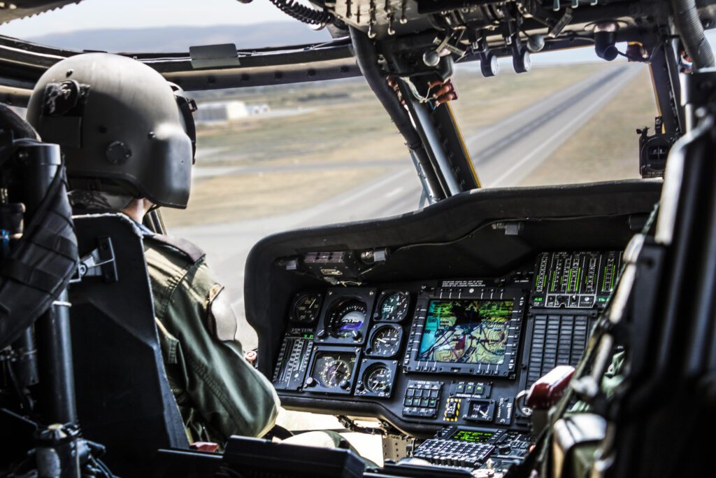 Army Helicopter Pilot Riding Military Helicopter